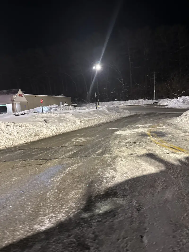 Driveway plowed and cleared at night