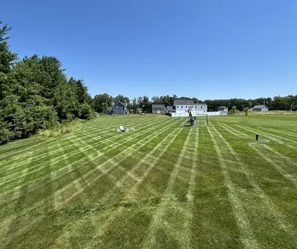 Freshly striped lawn on a large property